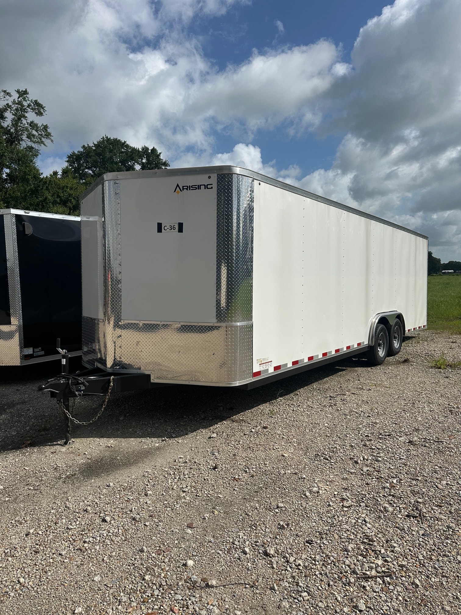 Arising enclosed cargo trailer white tandem axle