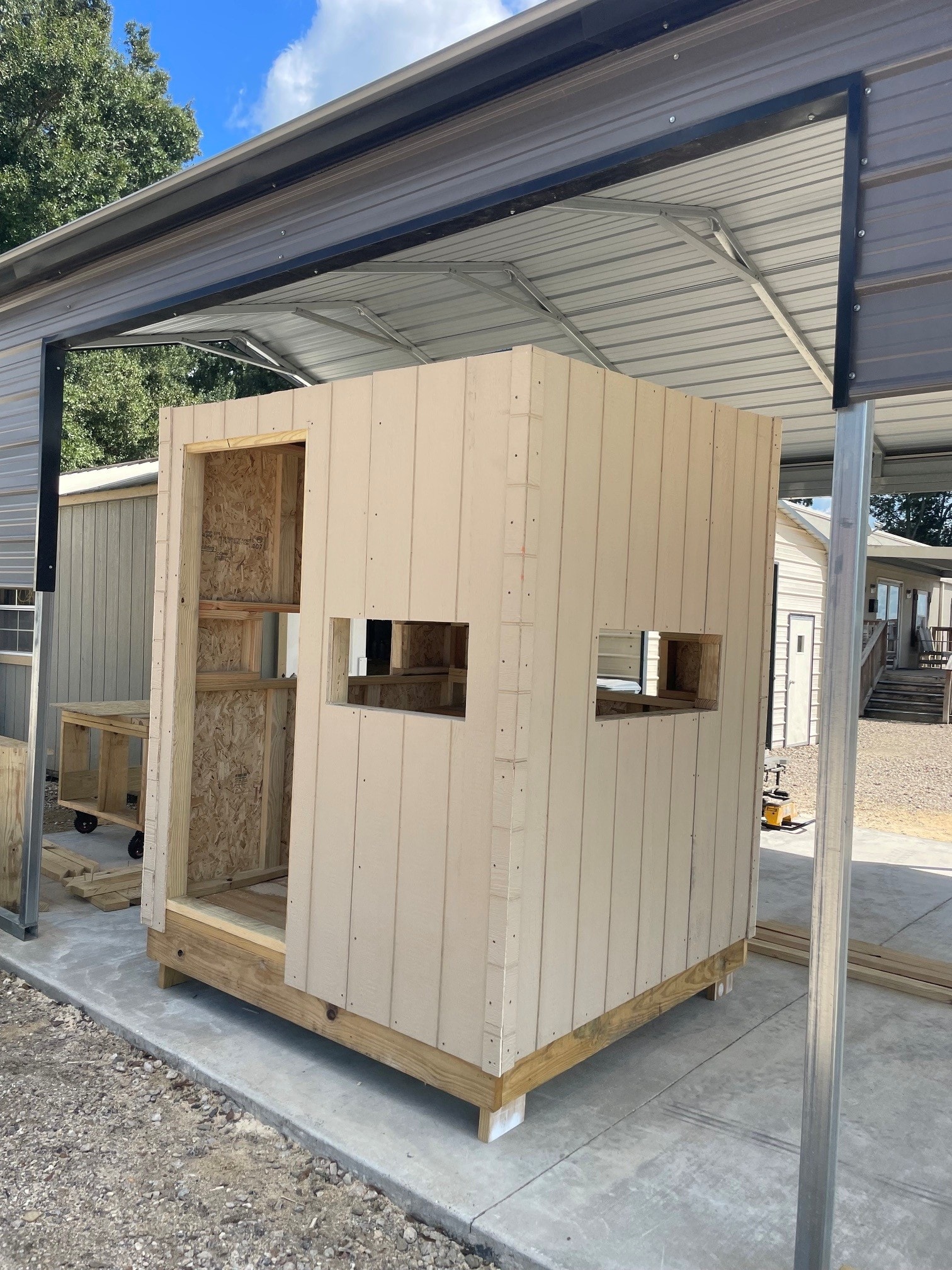 6x6 wood hunting blind before paint – front view with window openings, Lafayette LA area