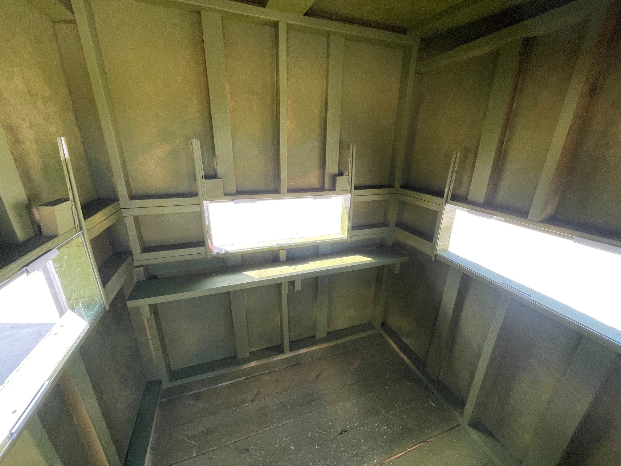 Interior of 6x6 hunting blind with shooting benches — Delta Trailer Sales LA