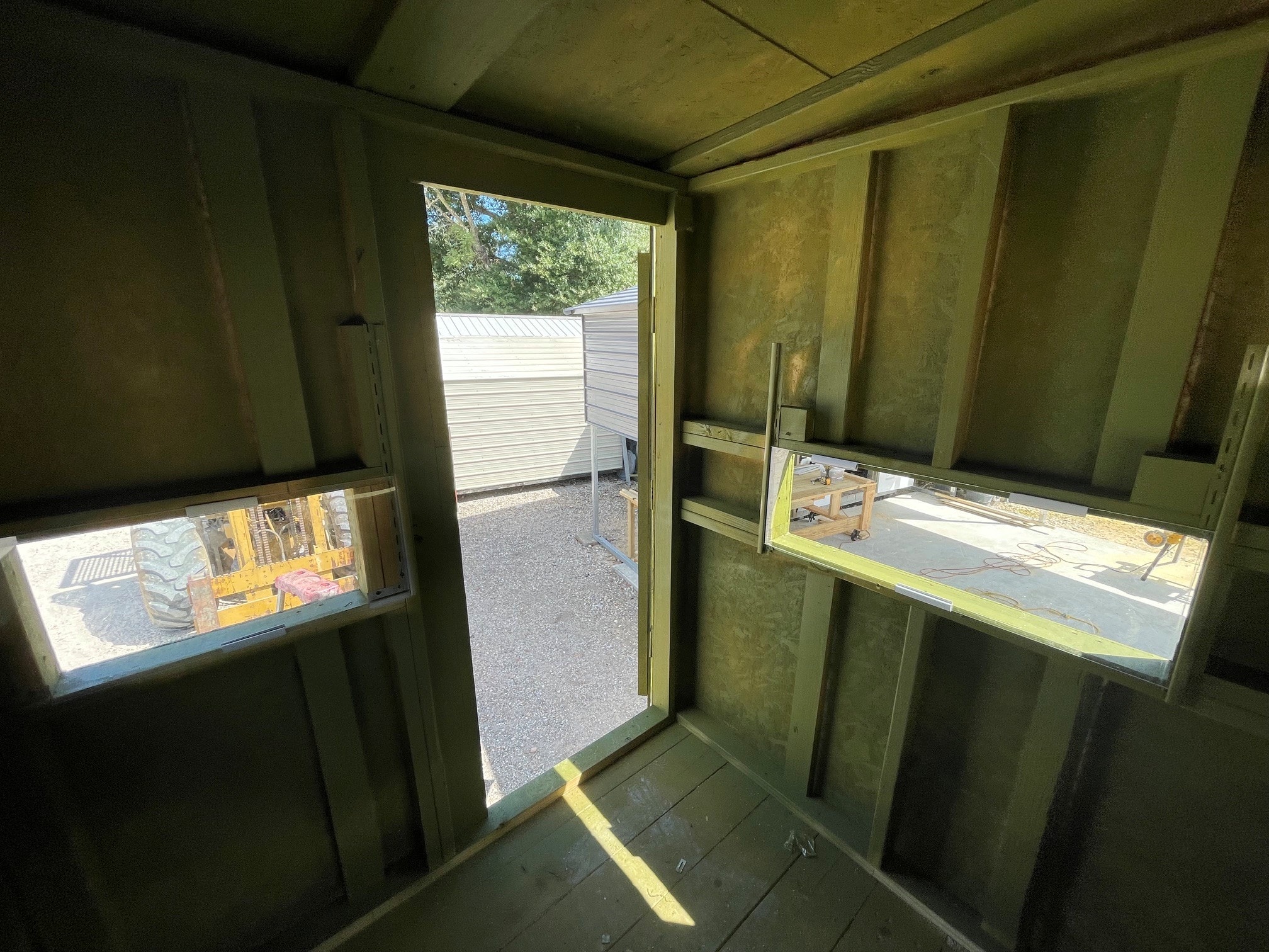 Interior 6x6 hunting stand with windows and door — Delta Trailer Sales Lafayette LA