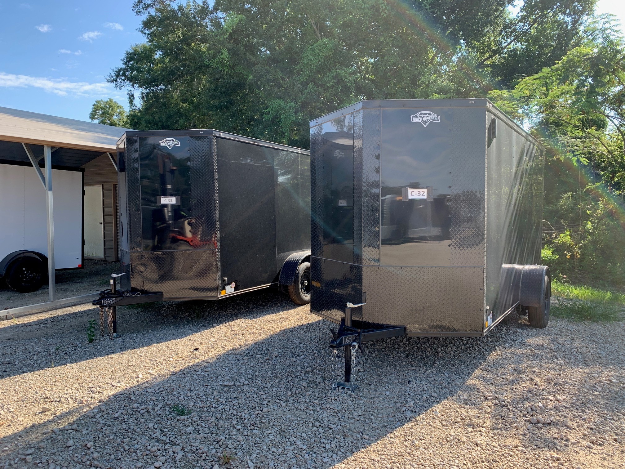 Diamond Cargo black with blackout trim single and tandem axle trailers at Delta Trailer Sales
