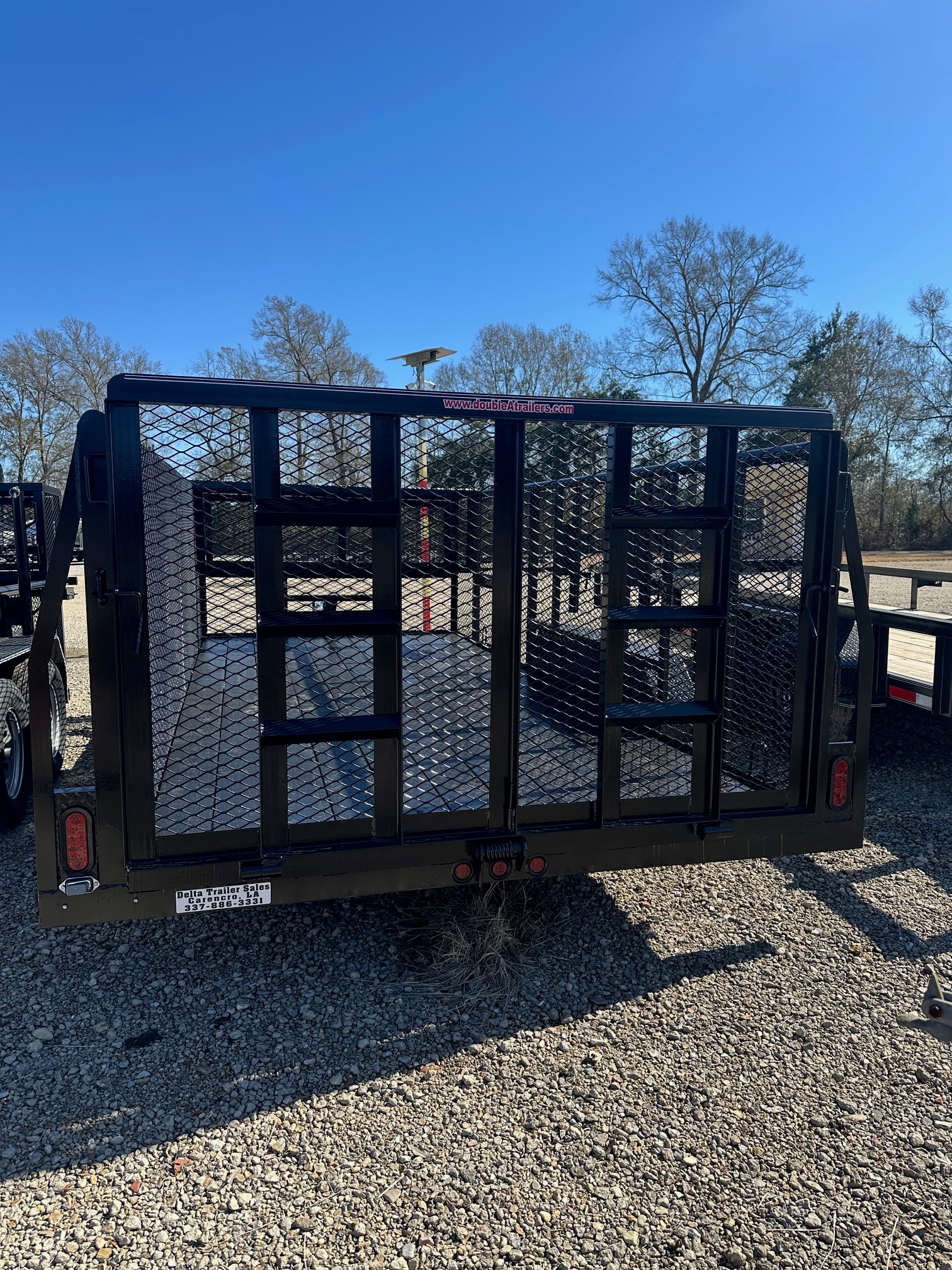 Double A heavy duty gate landscape trailer at Delta Trailer Sales