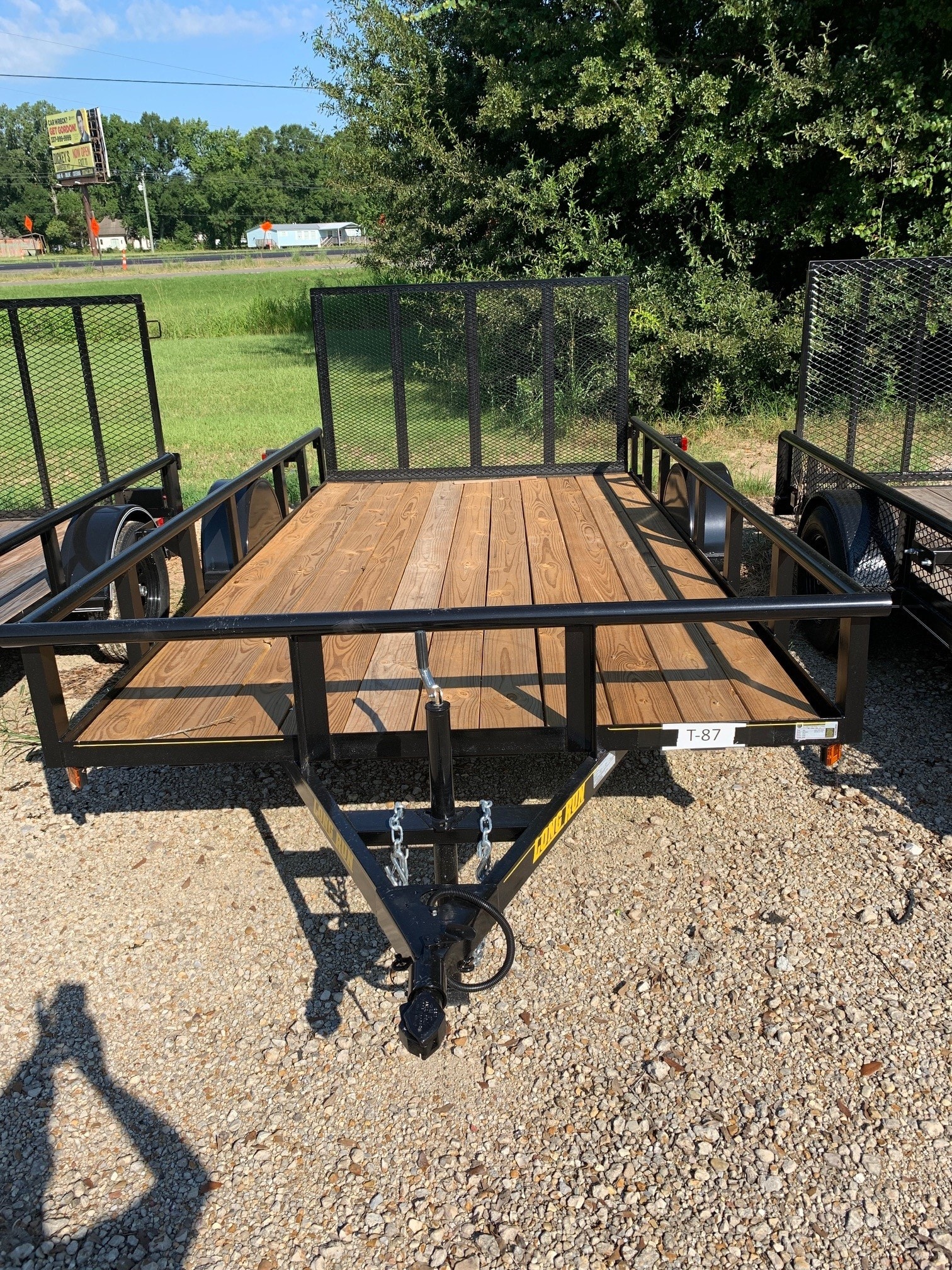 Long Run single axle utility trailer T-87 with wood deck at Delta Trailer Sales